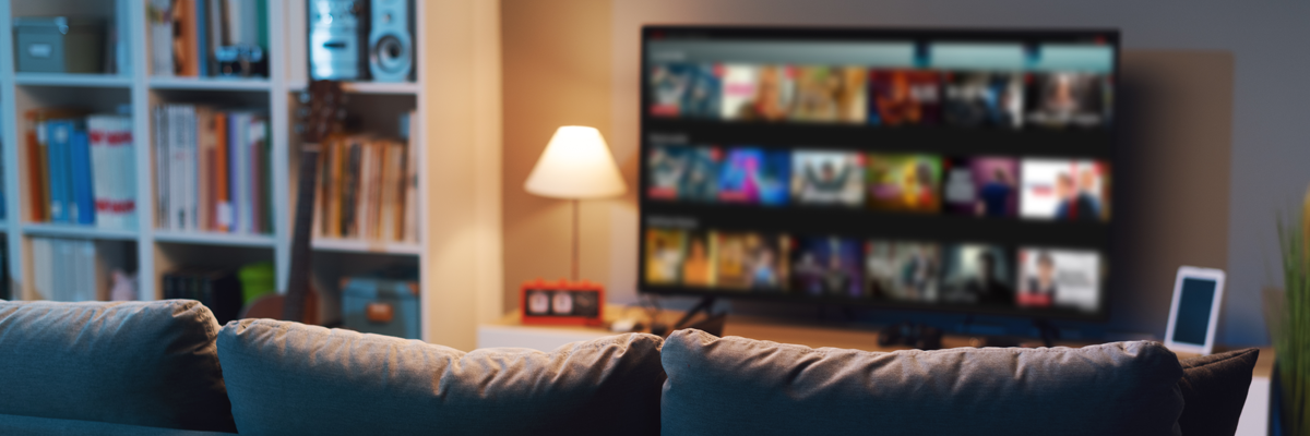 comfortable evening with couch bookshelves and tv